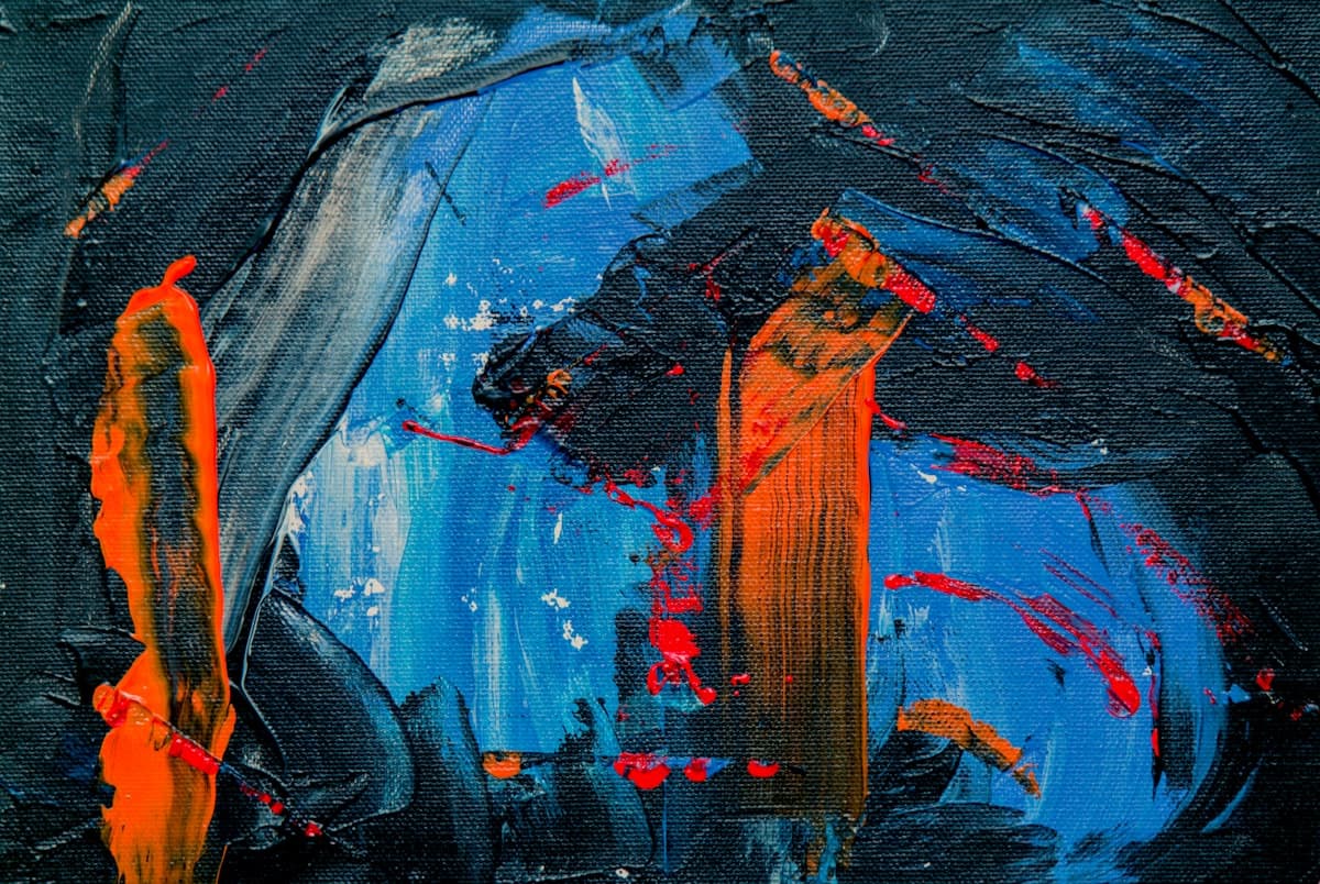 Curated paintings on the gallery wall